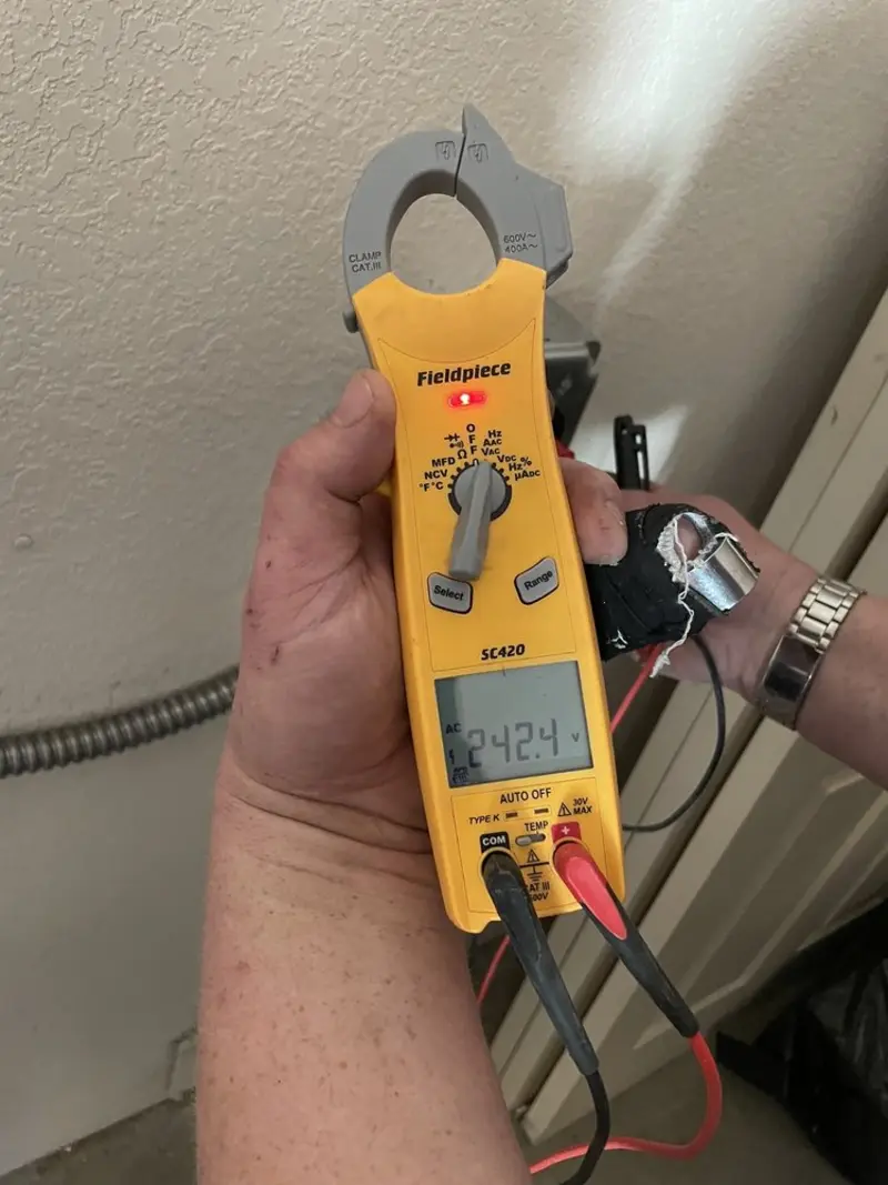 Voltage testing with clamp meter during Aluminum Wiring Replacement in Georgetown